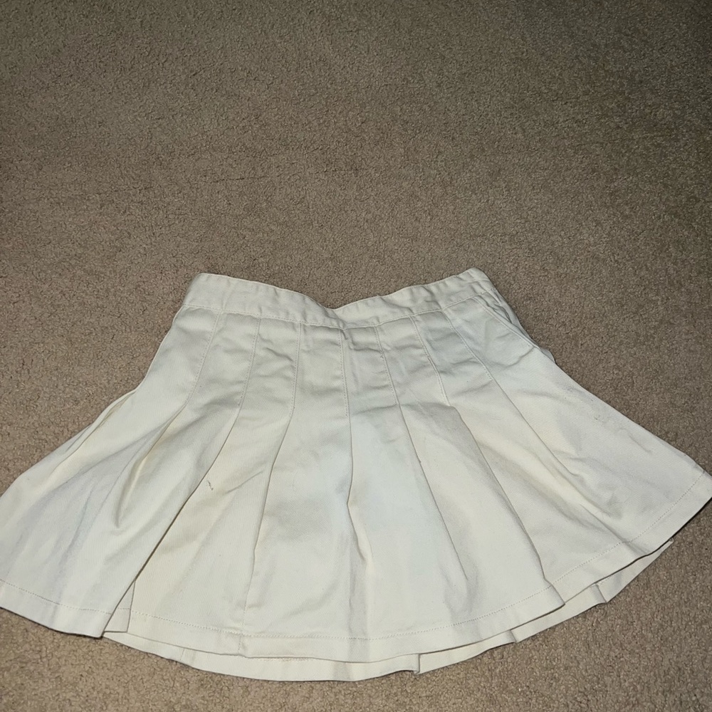 cream colored skirt